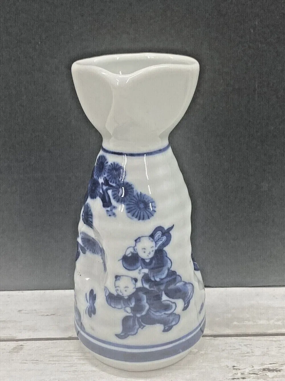 Small Antique Japanese Blue and White Porcelain Sakura Tree Sake Bottle